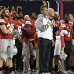 Ohio State Buckeyes head coach Urban Meyer during the national anthem before the game against the Oregon Ducks in the 2015 CFP National Championship Game at AT&T Stadium.